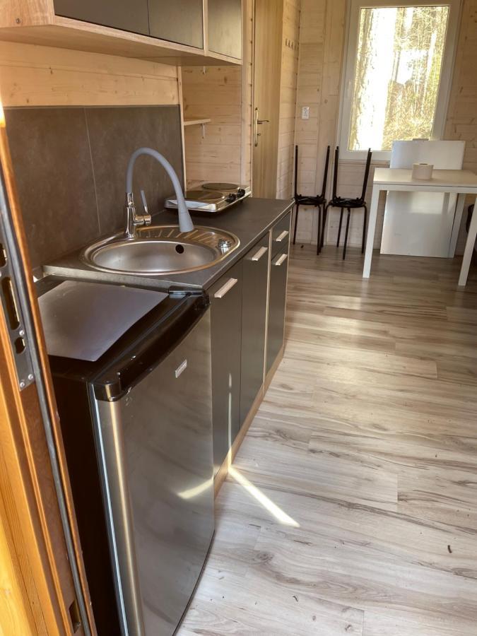 Domki I Pole Namiotowe Pod Sosnami Holiday home *